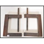 A pair of antique 19th Century wooden cabinet makers clamps with impressed makers marks for Parry of