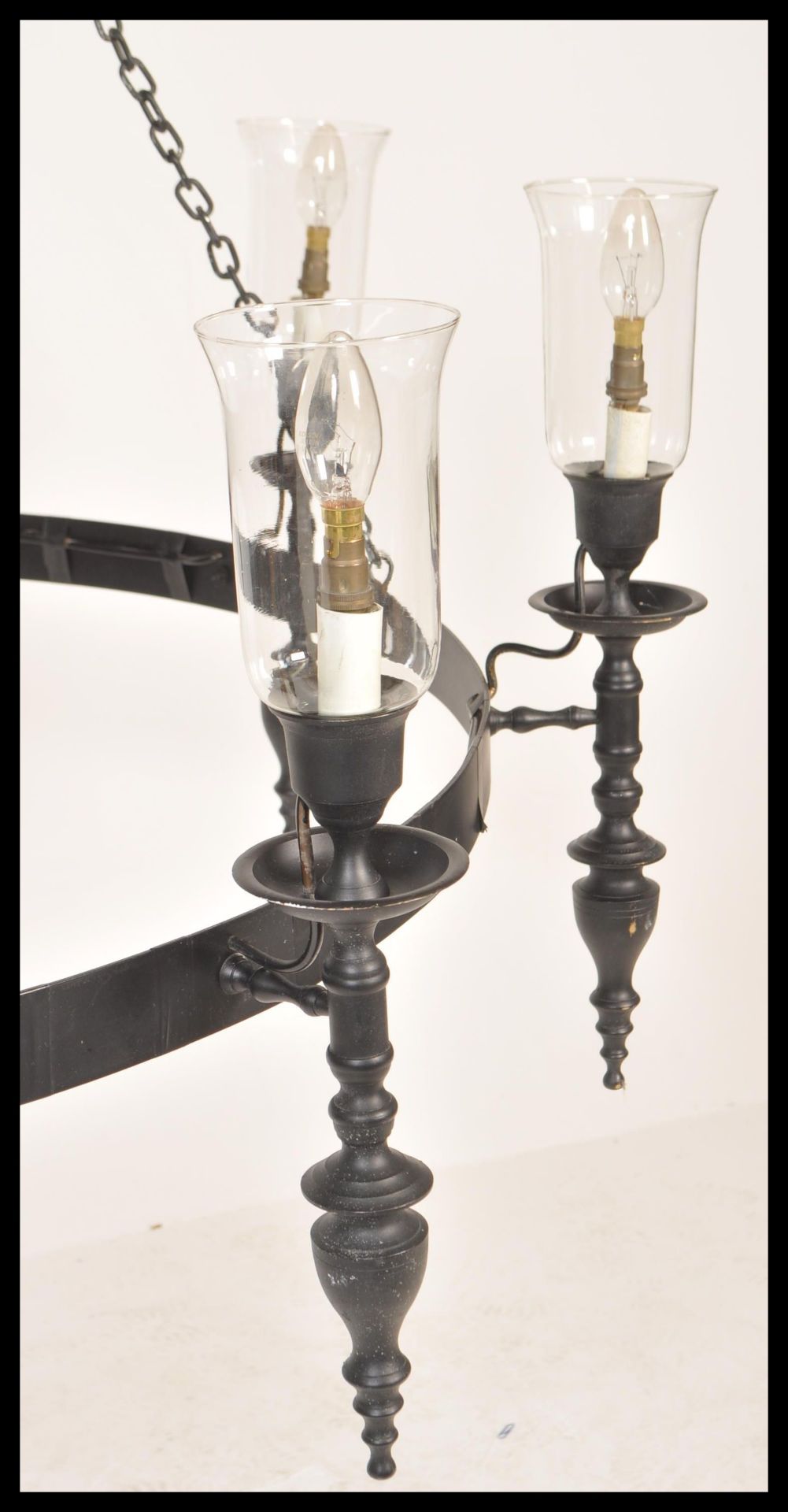 A large 20th Century ebonised iron ceiling light chandelier having eight ebonised sconces with - Bild 2 aus 7