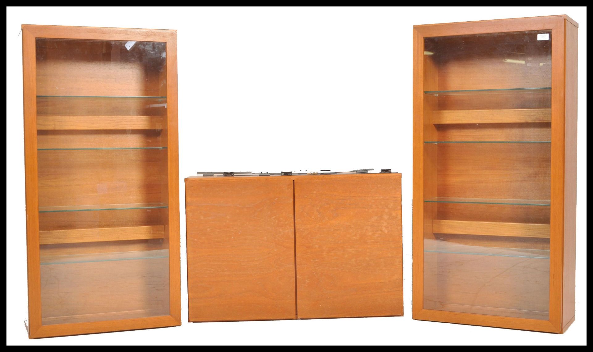 A retro 20th Century teak wood modular wall system by Tapley, the system consisting of three units