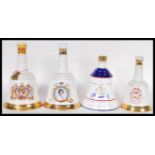 A selection of vintage Bell's whisky decanters to include a Princess Beatrice 1988 decanter, Charles