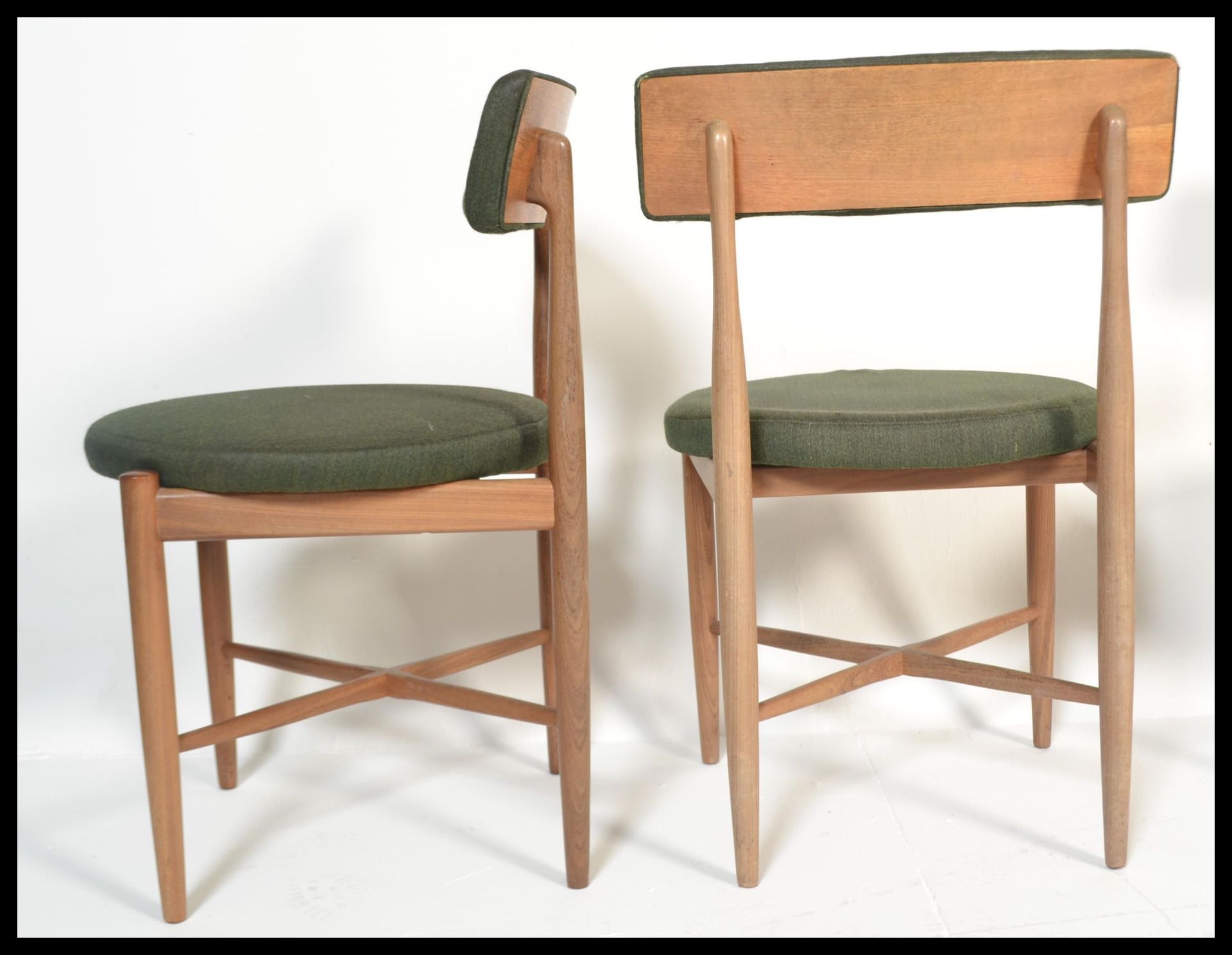 A set of four teak G-plan dining chairs designed by Koford Larsen. Raised on tapered turned legs - Image 8 of 9