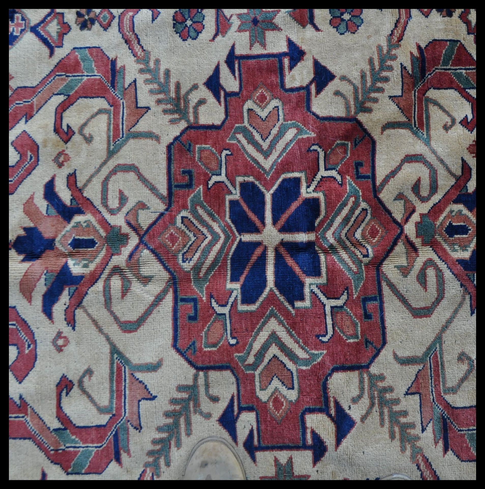 A 20th Century hand knotted Afghan carpet rug having a red ground with a central yellow panel with - Bild 2 aus 4