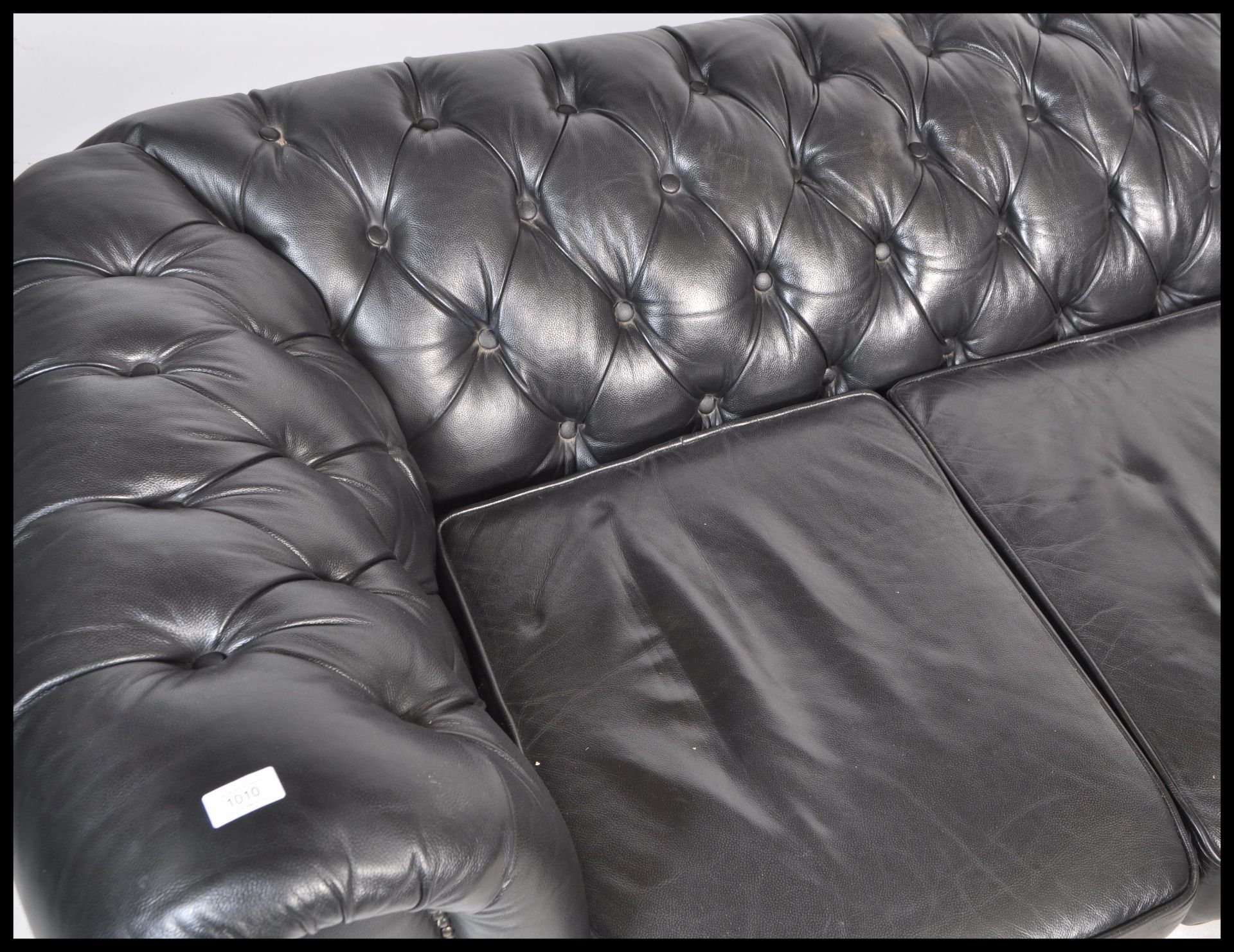 A contemporary black leather button back three seater Chesterfield sofa with button back and - Image 3 of 5