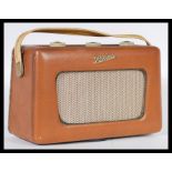 An early 20th century century vintage R300 Roberts transistor radio in the original brown vinyl