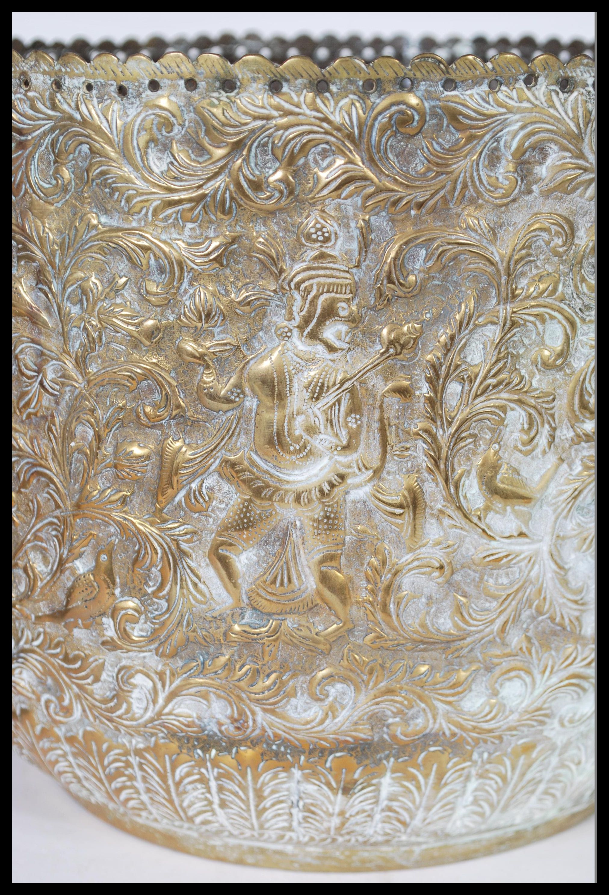 An early 20th Century Anglo Indian brass planter decorated in  relief together with another - Image 3 of 6