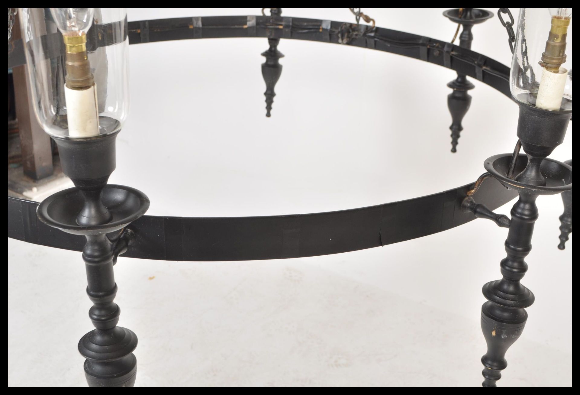 A large 20th Century ebonised iron ceiling light chandelier having eight ebonised sconces with - Bild 7 aus 7