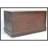 A 19th century Victorian pine blanket box with panelled sides having hinged top with open storage,