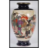 An early 20th Century Japanese Late Meiji period large Satsuma ware vase of Meiping shape having