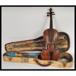 A 19th Century violin musical instrument of possible French origin having a two piece maple back