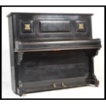 A 19th Century Victorian ebonised cased upright piano by ' Chappell, London ' iron framed and