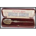 A silver hallmarked Coronation Anointing spoon bearing London hallmarks complete in the case. 17cm