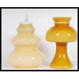 A vintage retro 20th century Riihimaki style mushroom lamp and ceiling light in mustard colour. Lamp