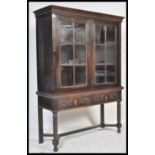 A good Victorian Jacobean commonwealth revival oak bookcase on stand. Raised on bobbin turned