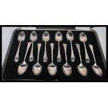 An early 20th Century cased set of 12 silver hallmarked teaspoons complete in fitted case.