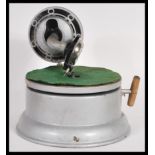 A rare and unusual vintage retro 20th Century small portable gramophone record player having brushed