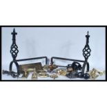 A collection of door furniture to include a Victorian cast iron door knocker, along with a lion mask
