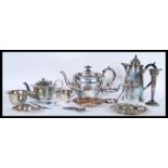 A group of vintage 20th Century silver plated items to include a Harrods of London water jug,