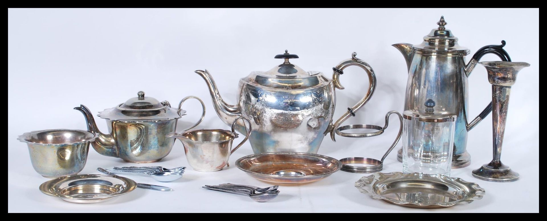 A group of vintage 20th Century silver plated items to include a Harrods of London water jug,