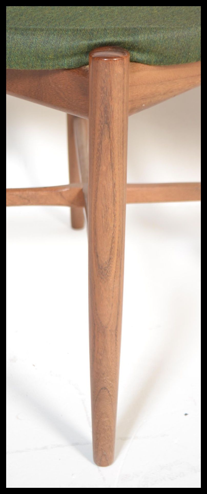 A set of four teak G-plan dining chairs designed by Koford Larsen. Raised on tapered turned legs - Image 5 of 9