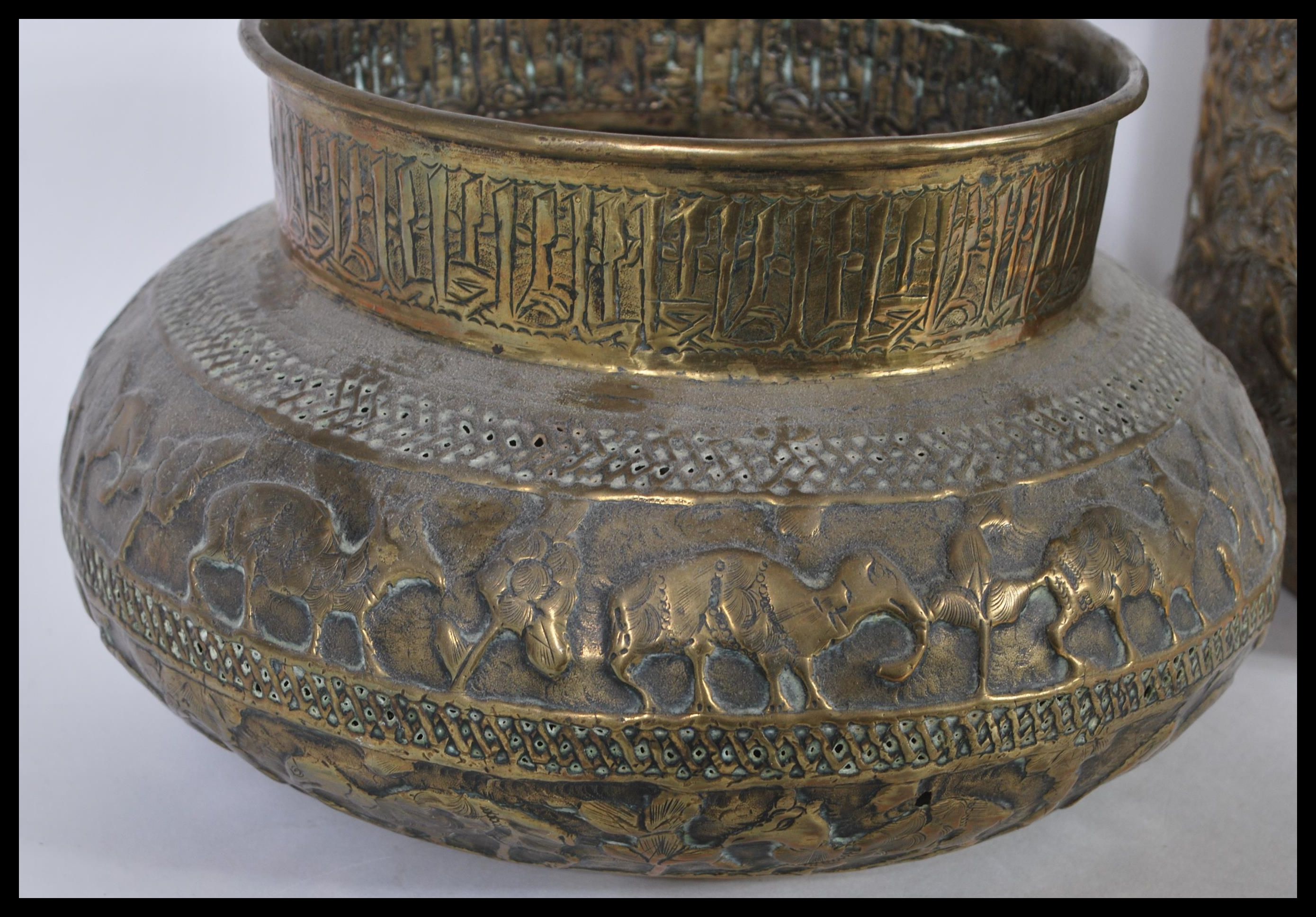 An early 20th Century Anglo Indian brass planter decorated in  relief together with another - Image 2 of 6