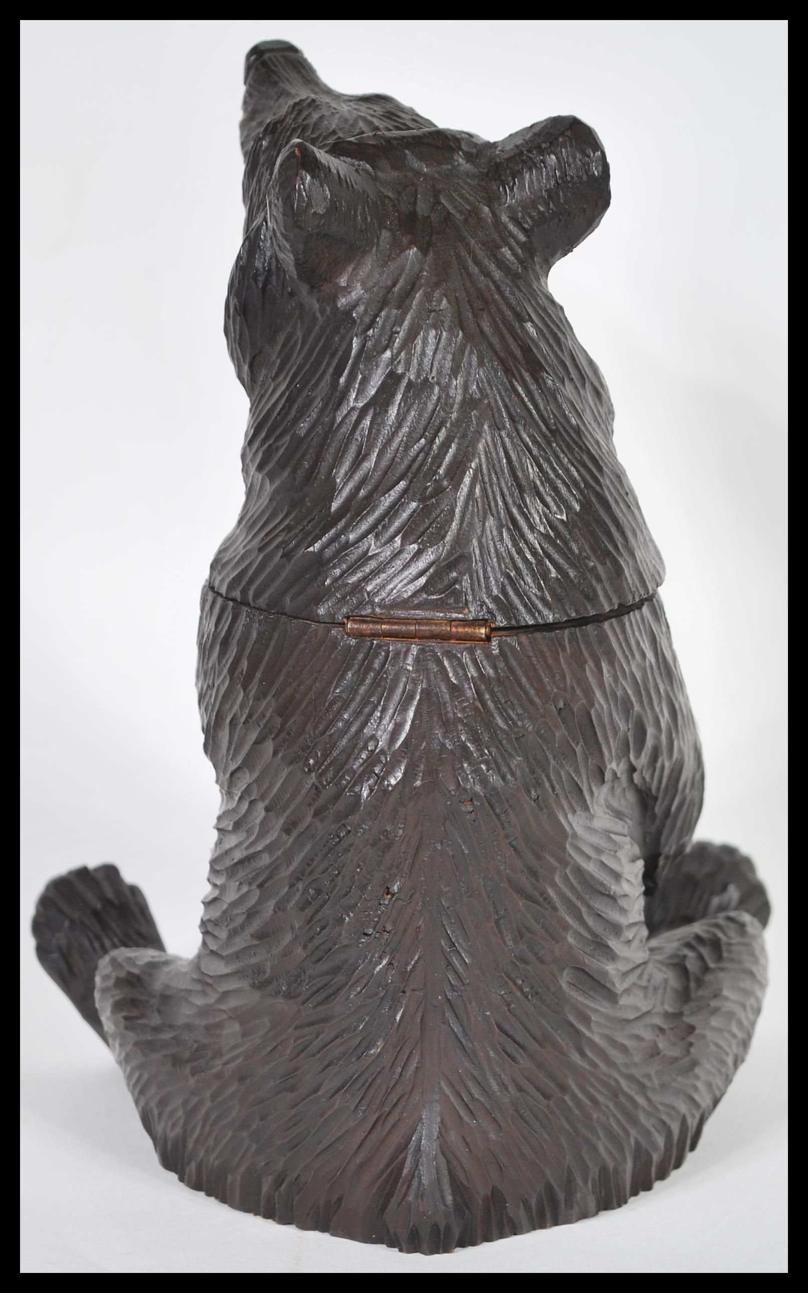 A German Black Forest hand carved wooden tobacco pot or tea caddy in the form of a bear having - Image 4 of 6