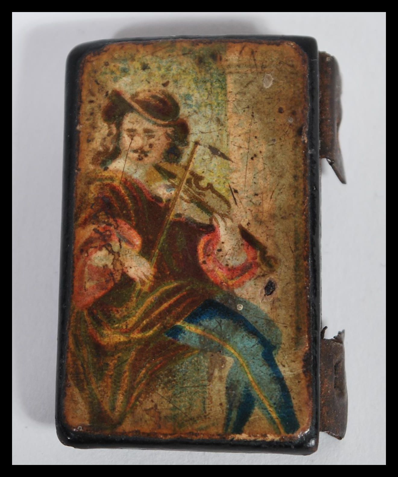 An 18th /19th Century lacquered hand painted top of a snuff box, the lid painted with a musician