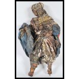 A believed 18th Century biblical nativity figure depicting one the the three Magi / Kings,