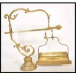 A large and impressive 19th Century French brass set of weighing scales raised on pedestal relief
