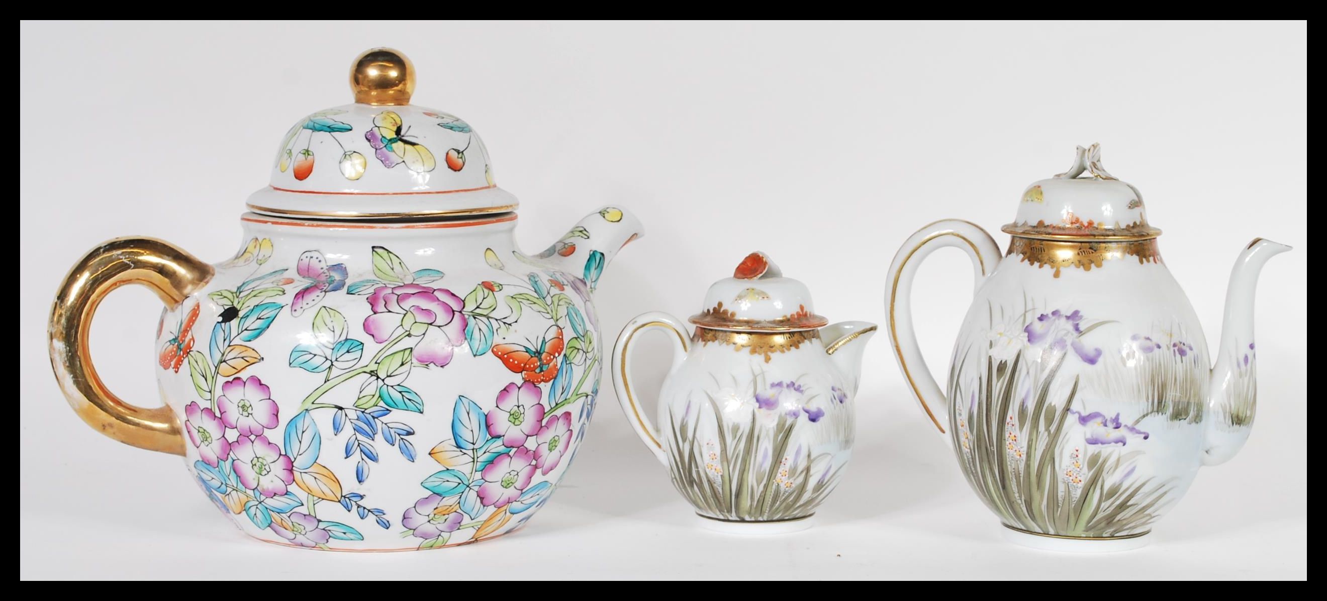 A 20th Century Japanese porcelain coffee pot with hand painted flowers,fauna and butterflies - Image 2 of 4