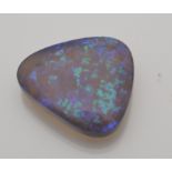 A single loose natural precious opal showing mainl