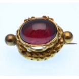 18CT GOLD VICTORIAN GARNET BROOCH