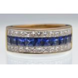 18CT GOLD SAPPHIRE AND DIAMOND HALF ETERNITY RING