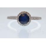 18CT WHITE GOLD SAPPHIRE AND DIAMOND LADIES CLUSTE