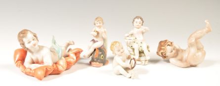 A COLLECTION OF FINE PORCELAIN CHERUB PUTTI FIGURI