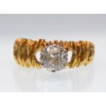 1970'S 18CT GOLD AND DIAMOND SOLITAIRE RING