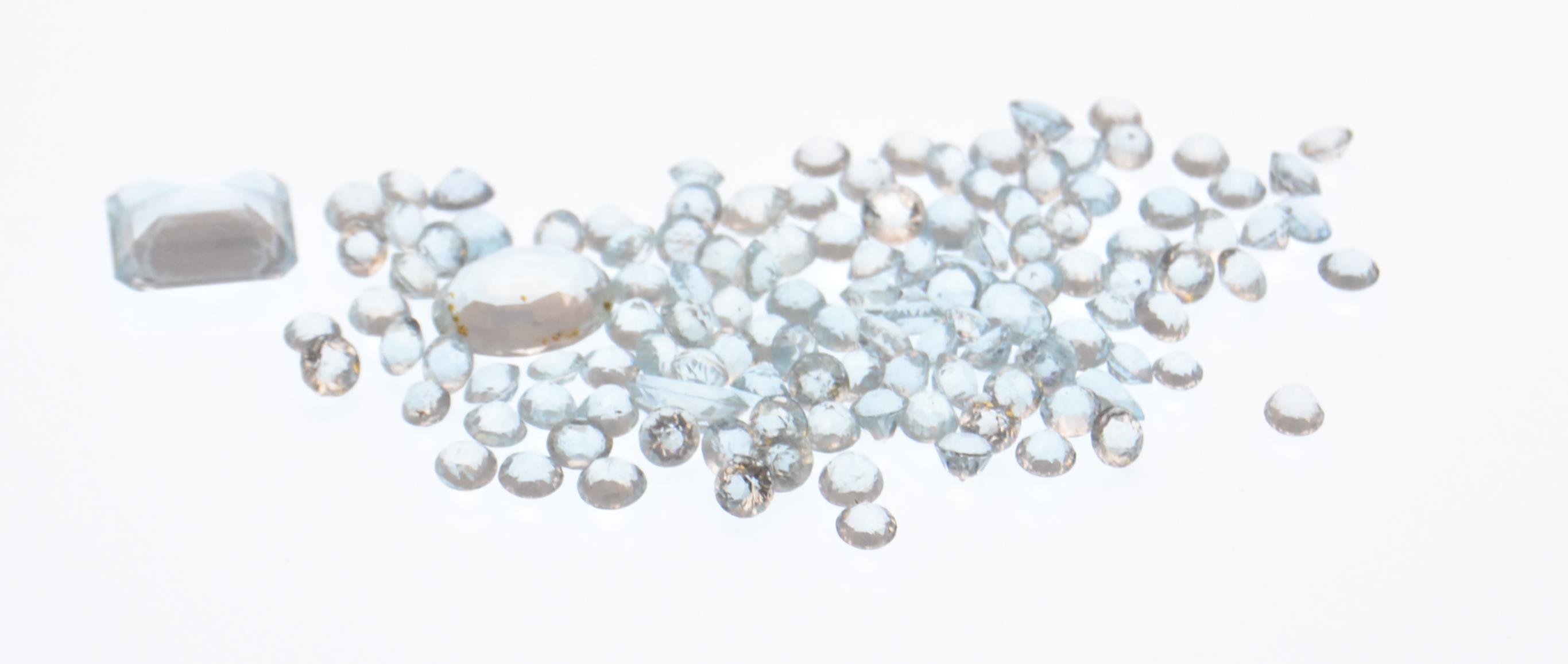 A selection of round mixed cut Aquamarine loose ge