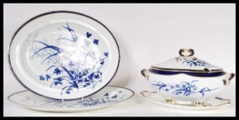A 20th Century Stoke China tureen having twin handles with a scrolled leaf handle to the top with
