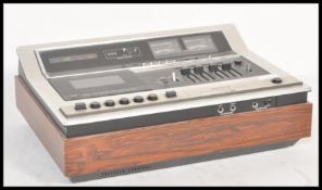A vintage 20th Century Sony stereo cassette tape player Model No TC 177SD. Teak cased with