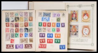 An early 20th Century stamp album containing stamps dating from the 19th Century from all around the