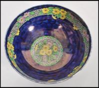 A vintage early 20th century Mailing lustre bowl in the Primrose pattern 6403. Raised on small