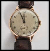 A vintage mid 20th Century hallmarked 9ct gold Accurist WW2 era military watch set to a vintage
