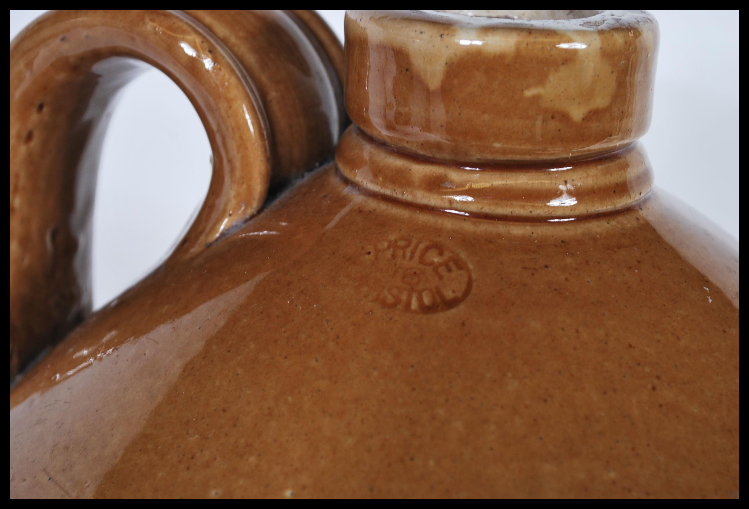 A large antique vintage stoneware flagon with notation to front for G. C. King & Co of Bristol. - Image 2 of 4