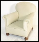 A late 19th early 20th Century armchair in the man