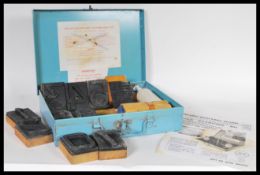 A vintage ' Dalton Kleermark ' cold cattle branding kit containing wooden and rubber block number