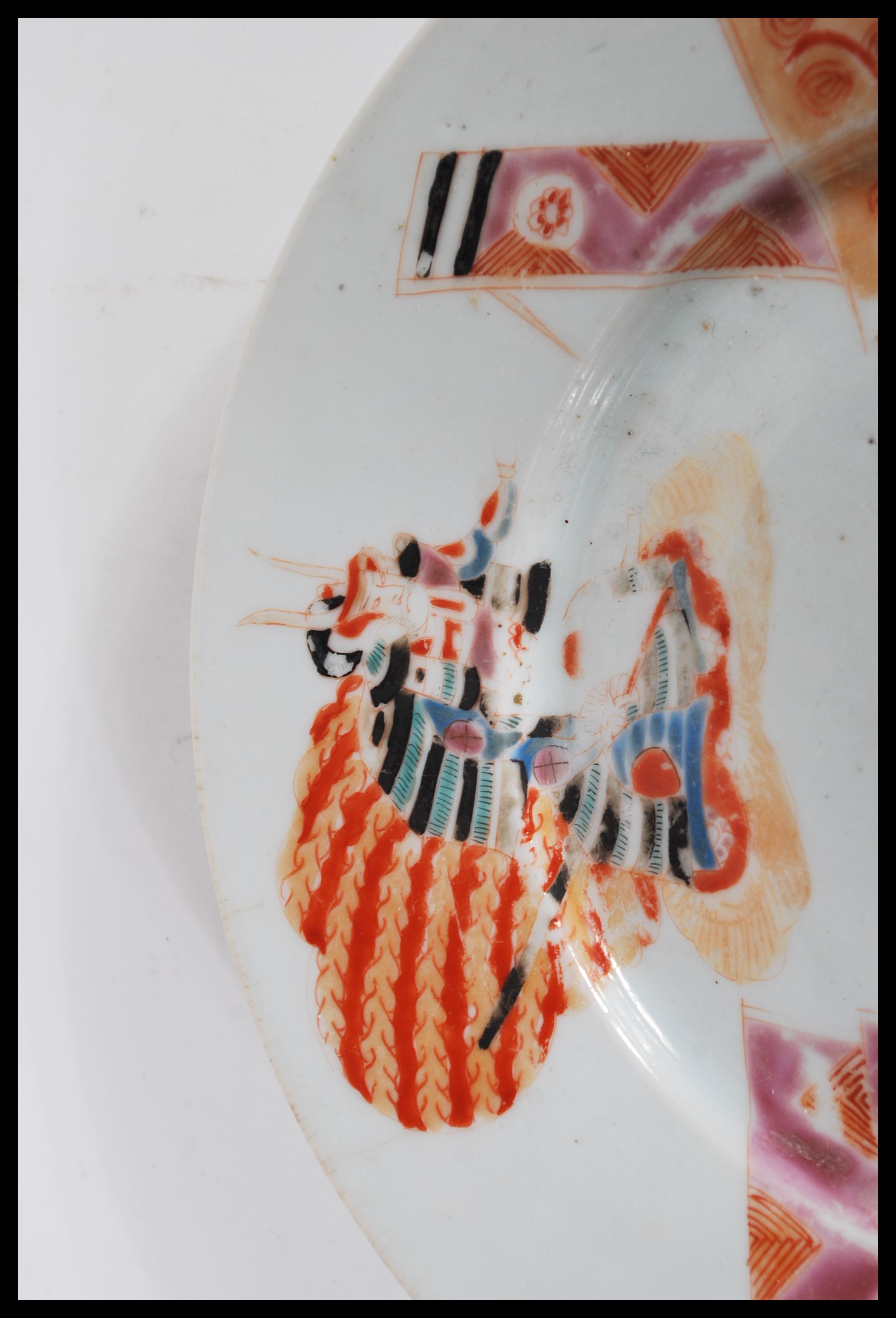 A 19th Century Japanese plate hand decorated with Samurai warriors and standards having character - Image 3 of 6