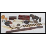 A good collection of mixed items dating from the 19th Century to include a Tibetan pendant, bone and