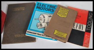 A collection of assorted vintage / antique manuals and catalogues to include a large Buck &