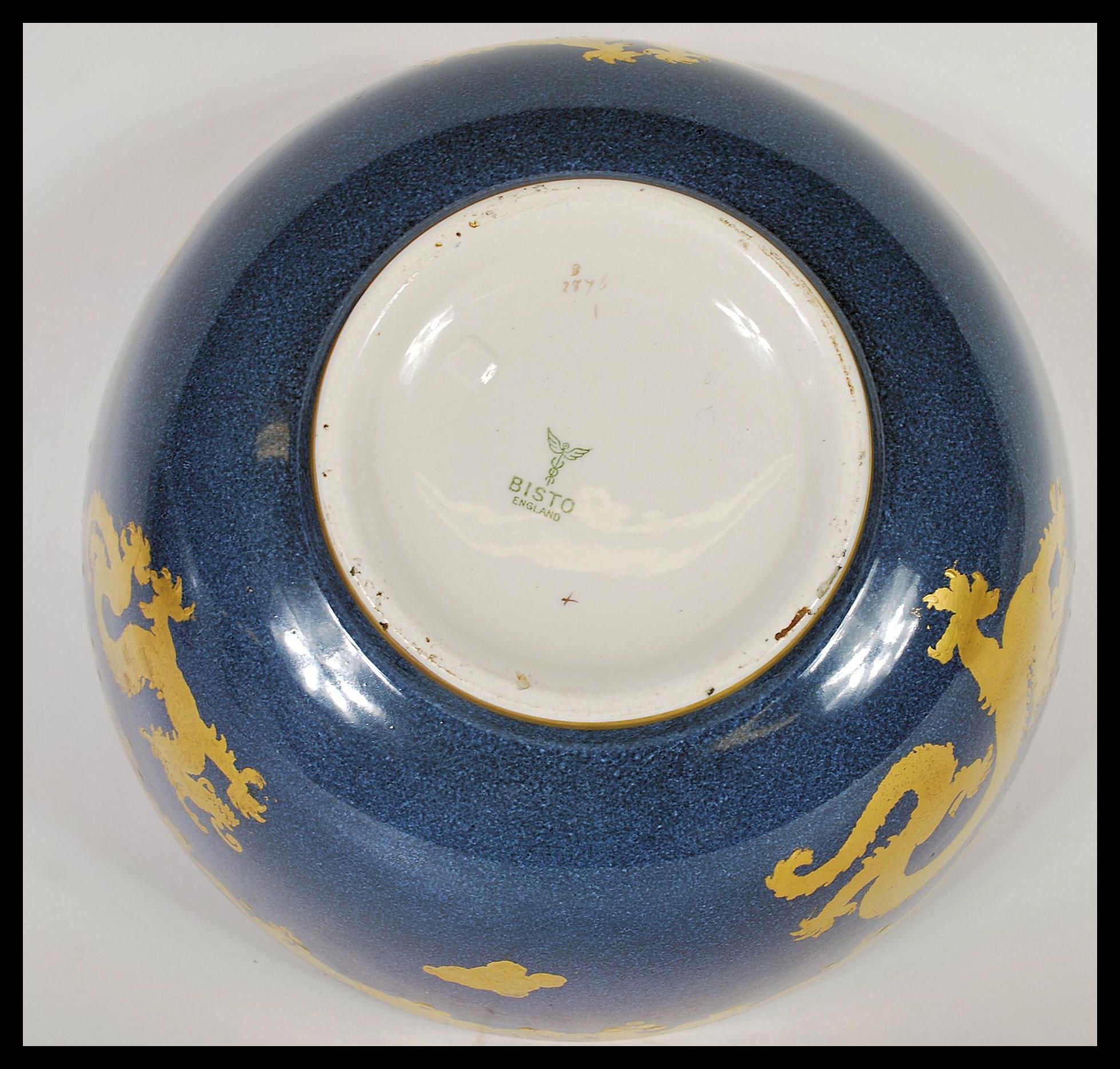 A vintage 20th Century Chinese influences dragon centerpiece bowl of good proportions having a - Image 6 of 6