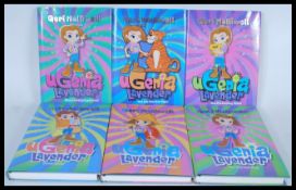 A collection of signed Geri Halliwell uGenia Lavender books including six editions, all signed to