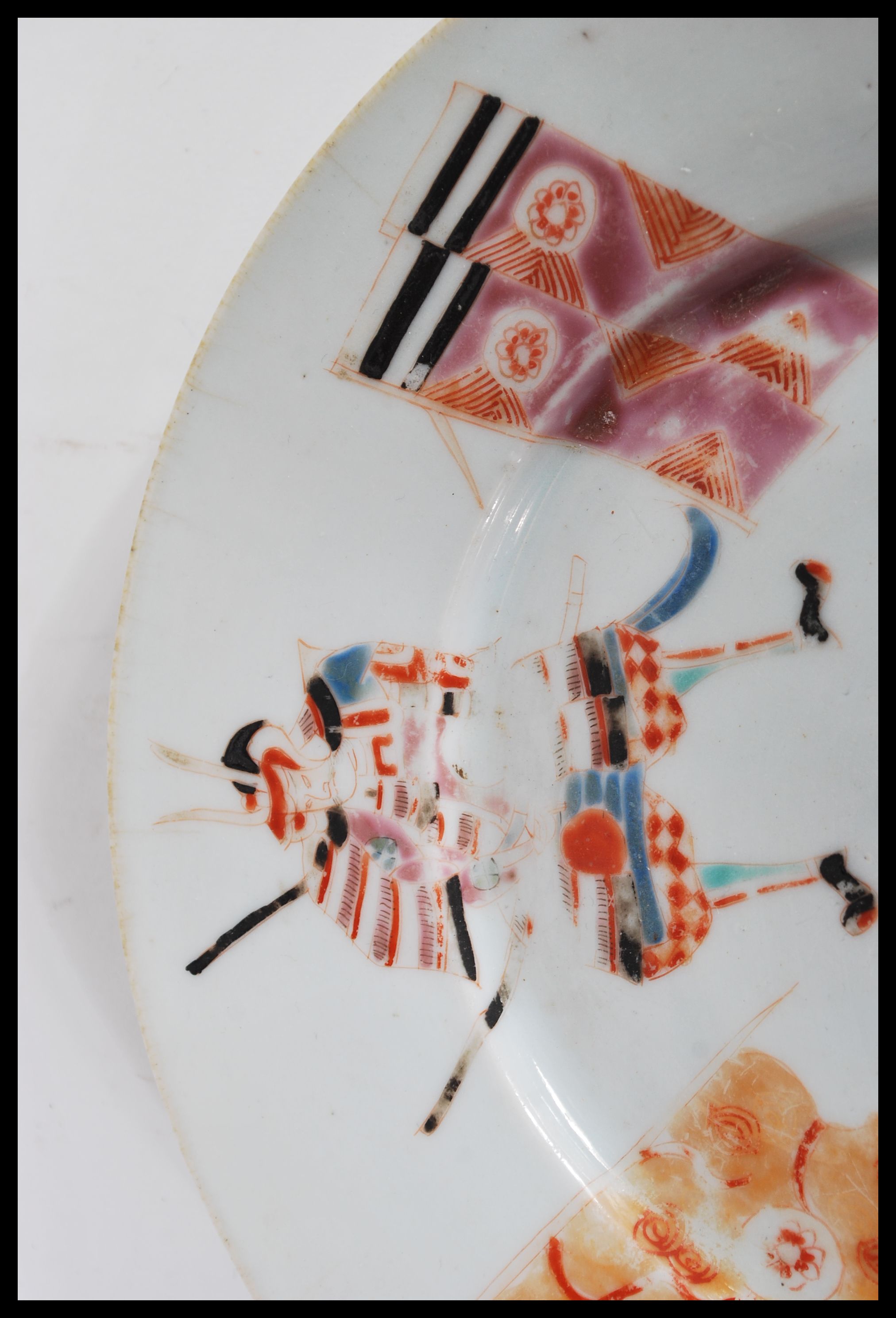 A 19th Century Japanese plate hand decorated with Samurai warriors and standards having character - Image 4 of 6